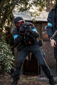 Action-packed paintball scene with players in tactical gear and paintball guns, ready to engage in a competitive match.