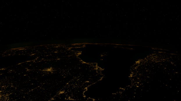 Stunning aerial view of Earth's city lights illuminating the darkness of space.